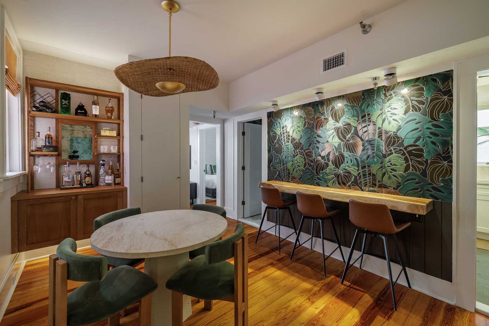 Dining room shot featuring built-in bar and sitting area